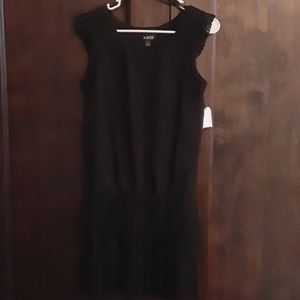 Amy Byer: Fit and Flare  black dress with ruffles on sleeves and bottom bodice